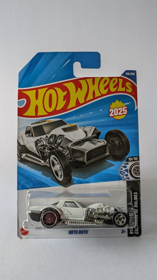 Hot Wheels car in packaging on a gray background
