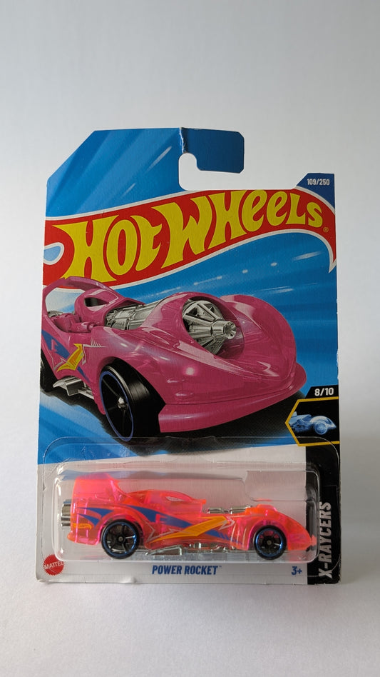Hot Wheels Power Rocket toy car in packaging on a gray background