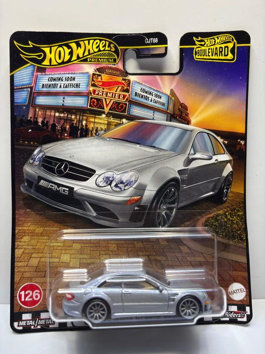 Hot Wheels Mercedes-Benz CLK AMG model car in packaging with theater background