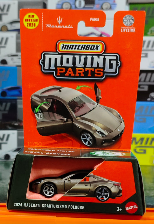 Matchbox toy car packaging with 'Moving Parts' label on an orange background