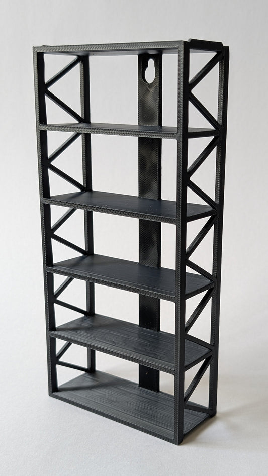 Black metal stand with geometric design on a white background