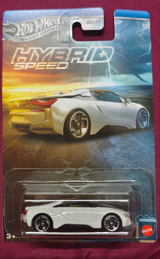 Hot Wheels hybrid speed car model in packaging on a maroon background