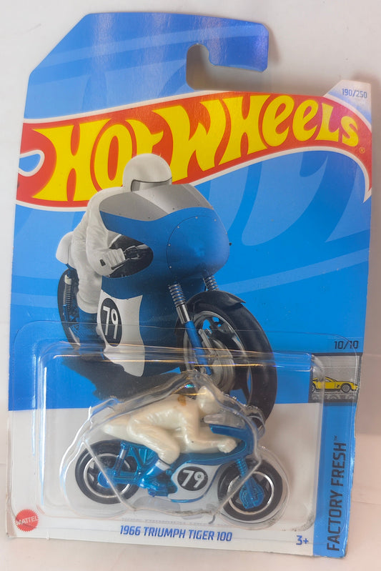 Hot Wheels – 1966 Triumph Tiger 100 motorcycle toy in packaging on a white background Front Pack