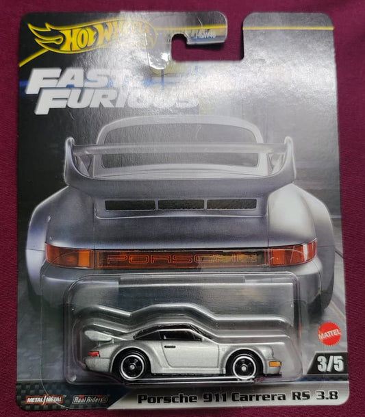 Toy car packaging with 'Fast & Furious' branding on a maroon background