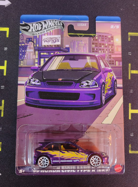 Hot Wheels Honda Civic Type R toy car in packaging with cityscape background