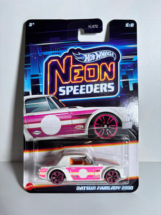 Hot Wheels Neon Speeders Datsun Fairlady 2000 toy car in packaging on a gray background