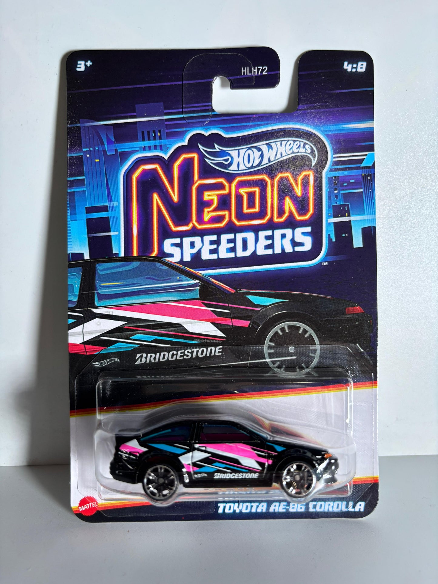Hot Wheels Neon Speeders toy car packaging on a white background