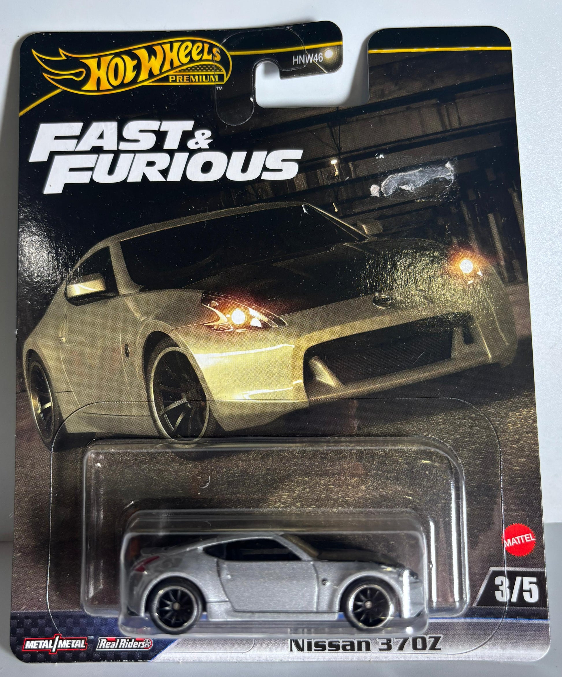 Hot Wheels Fast & Furious Nissan 370Z toy car in packaging on a gray background front pack view