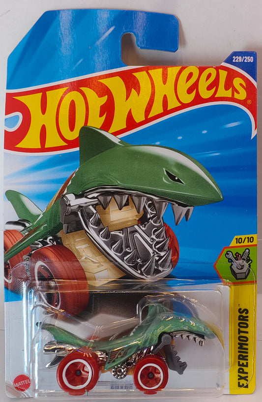 Hot Wheels shark-shaped car toy in packaging on a white background Front Pack