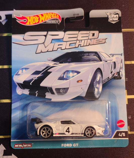 Hot Wheels Speed Machines Ford GT toy car in packaging on a black surface