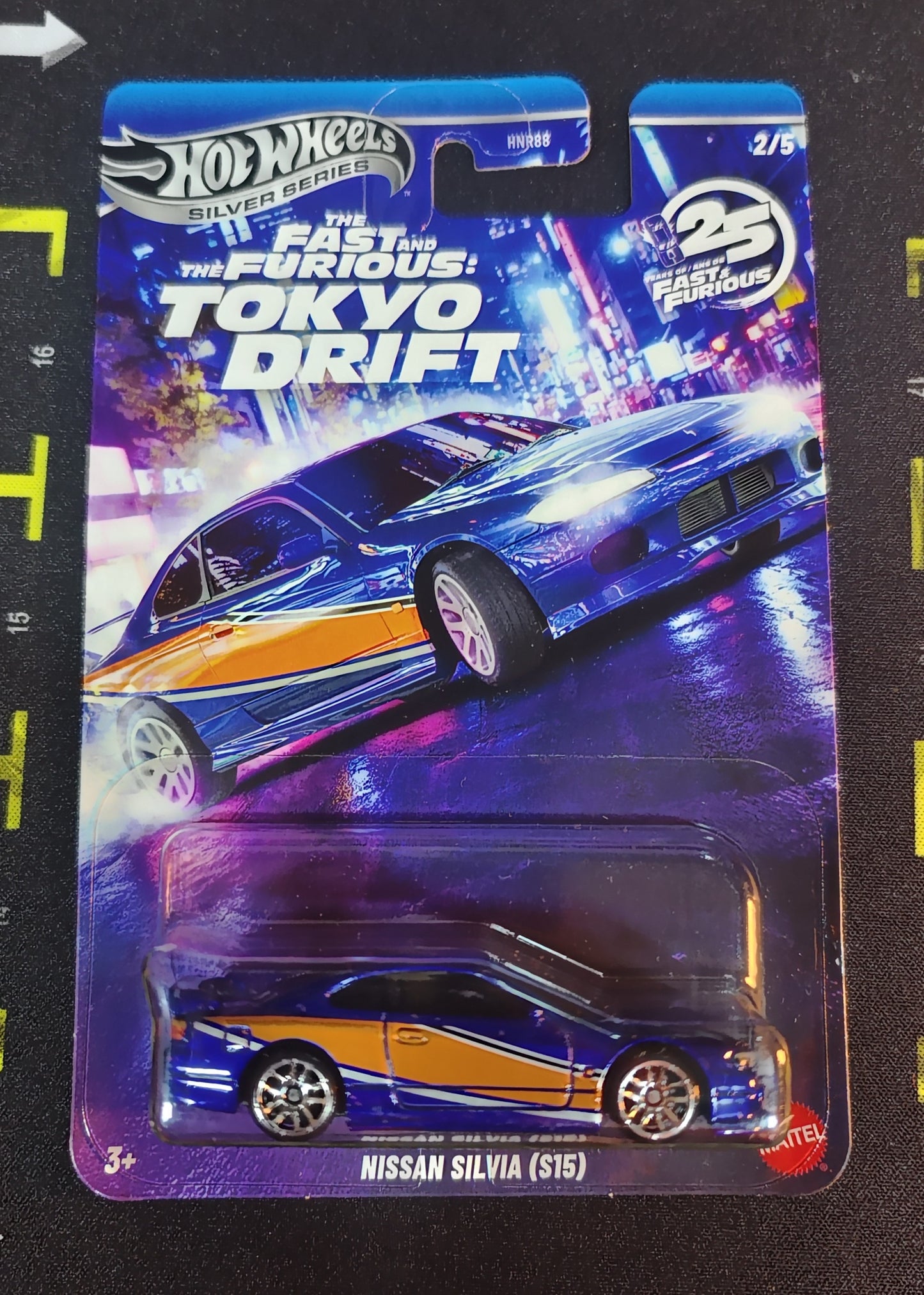 Hot Wheels Tokyo Drift Nissan Silvia toy car in packaging on a dark background