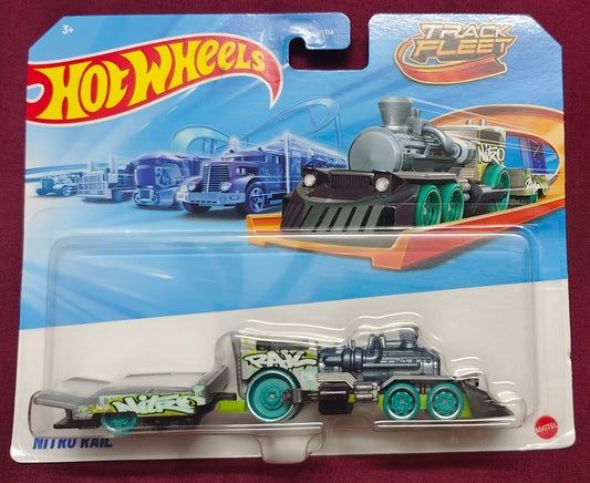 Hot Wheels train toy in packaging on a maroon background