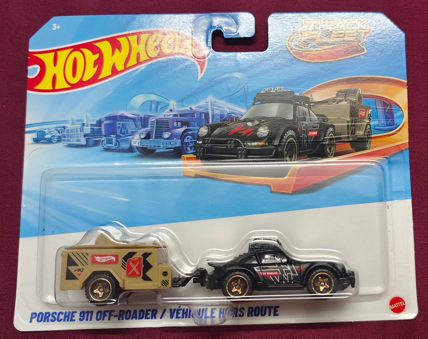 Hot Wheels toy car on a red background