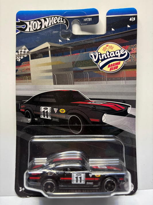 Hot Wheels vintage racing club car in packaging with Hot Wheels logo.