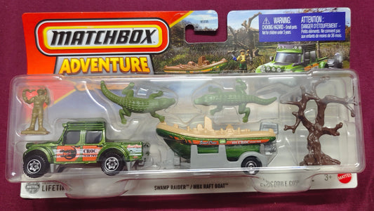 Model train set in packaging with Matchbox branding on a purple background