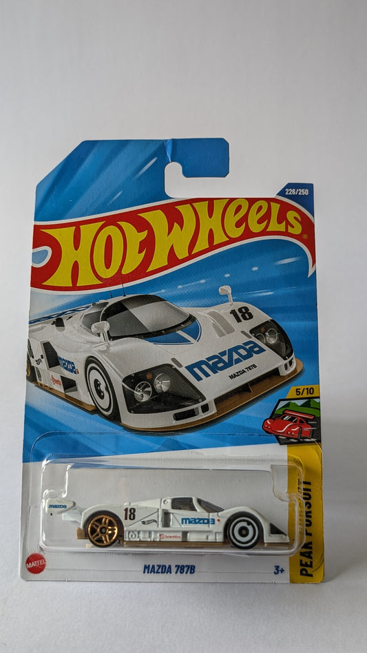 Hot Wheels Mazda 787B toy car in packaging on a white background