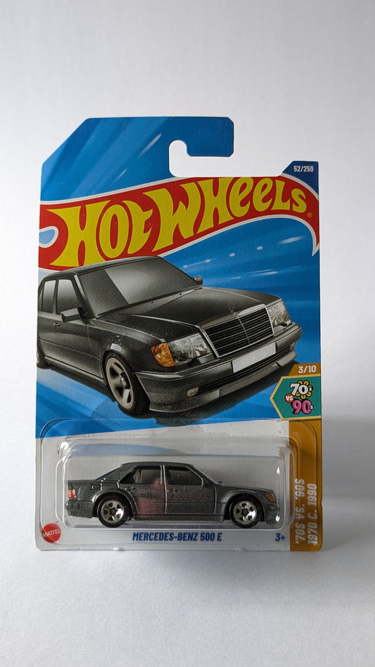 Hot Wheels Mercedes-Benz 500E toy car in packaging on a gray background