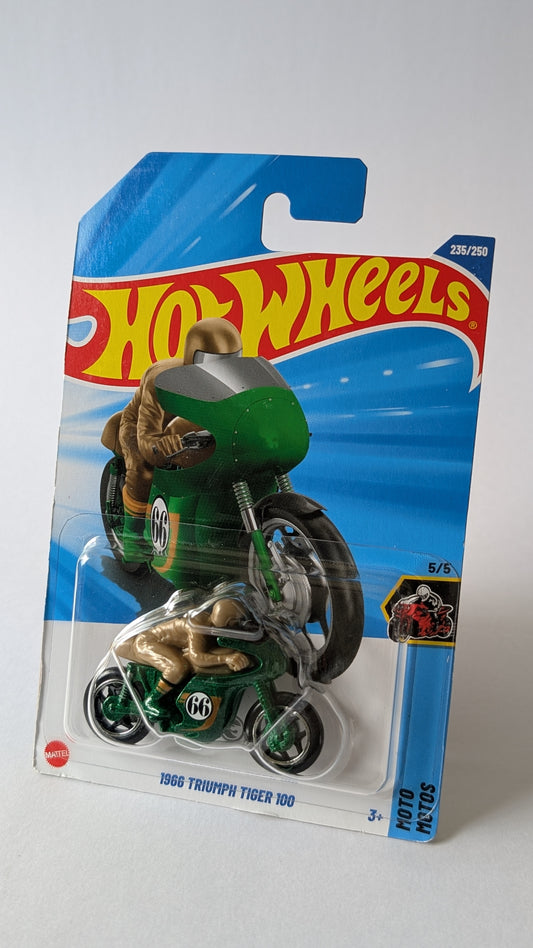 Hot Wheels toy motorcycle figure in packaging on a white background