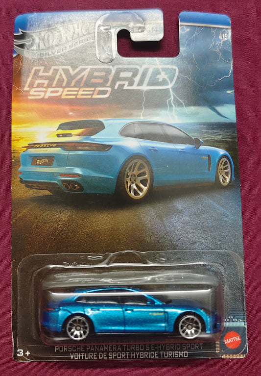 Blue Hot Wheels car in packaging on a maroon background