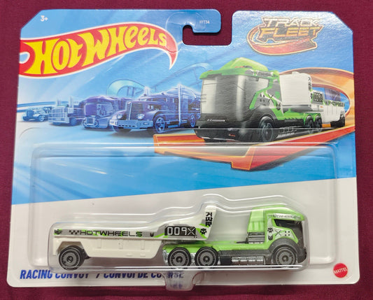 Toy truck on a Hot Wheels packaging with a red background